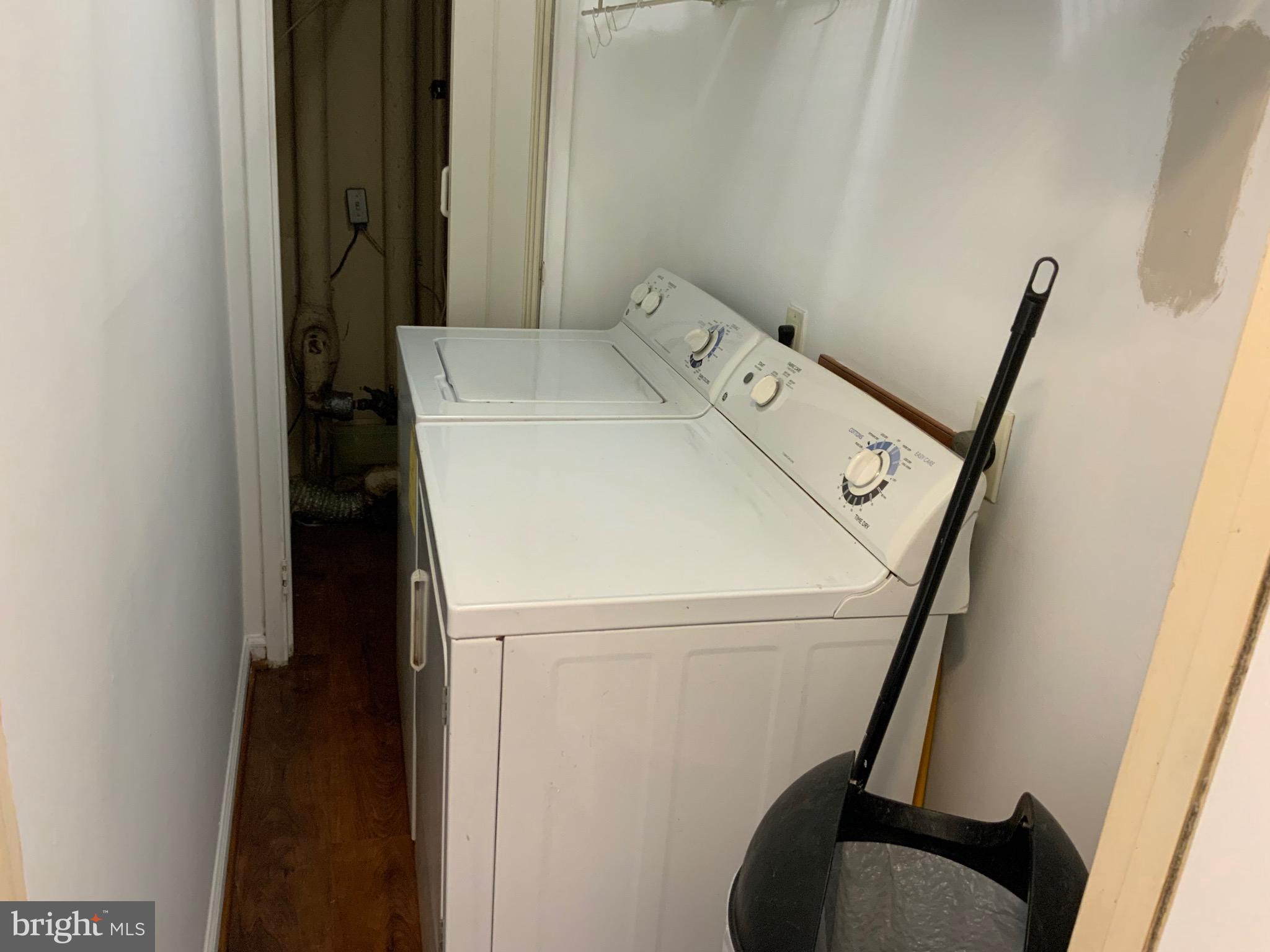 3744 Bel Pre Road, Unit 10 Silver Spring, MD 20906 - Photo 23 of 23 a utility room with dryer and washer