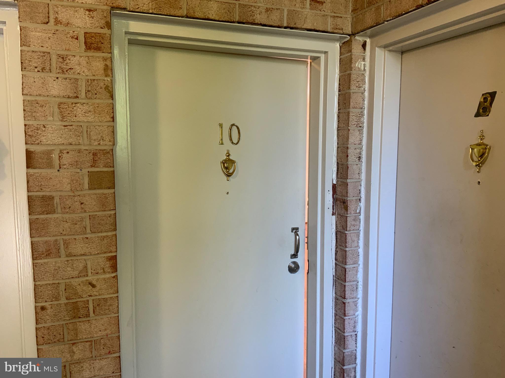3744 Bel Pre Road, Unit 10 Silver Spring, MD 20906 - Photo 4 of 23 a bathroom with a shower and a shower