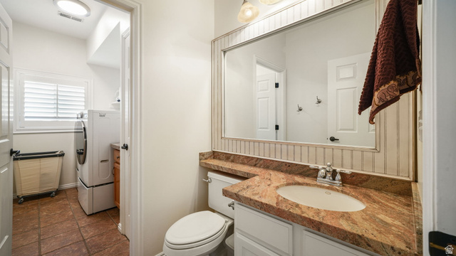 11128 South Barrett Pk Circle Sandy, UT 84092 - Photo 13 of 36 Bathroom vanity featuring an oval undermount sink, a polished chrome faucet, and a spacious granite countertop with an integrated backsplash
