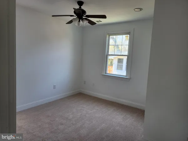 a view of a window in an empty room