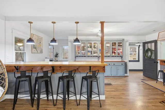 a view of a kitchen from a dining room