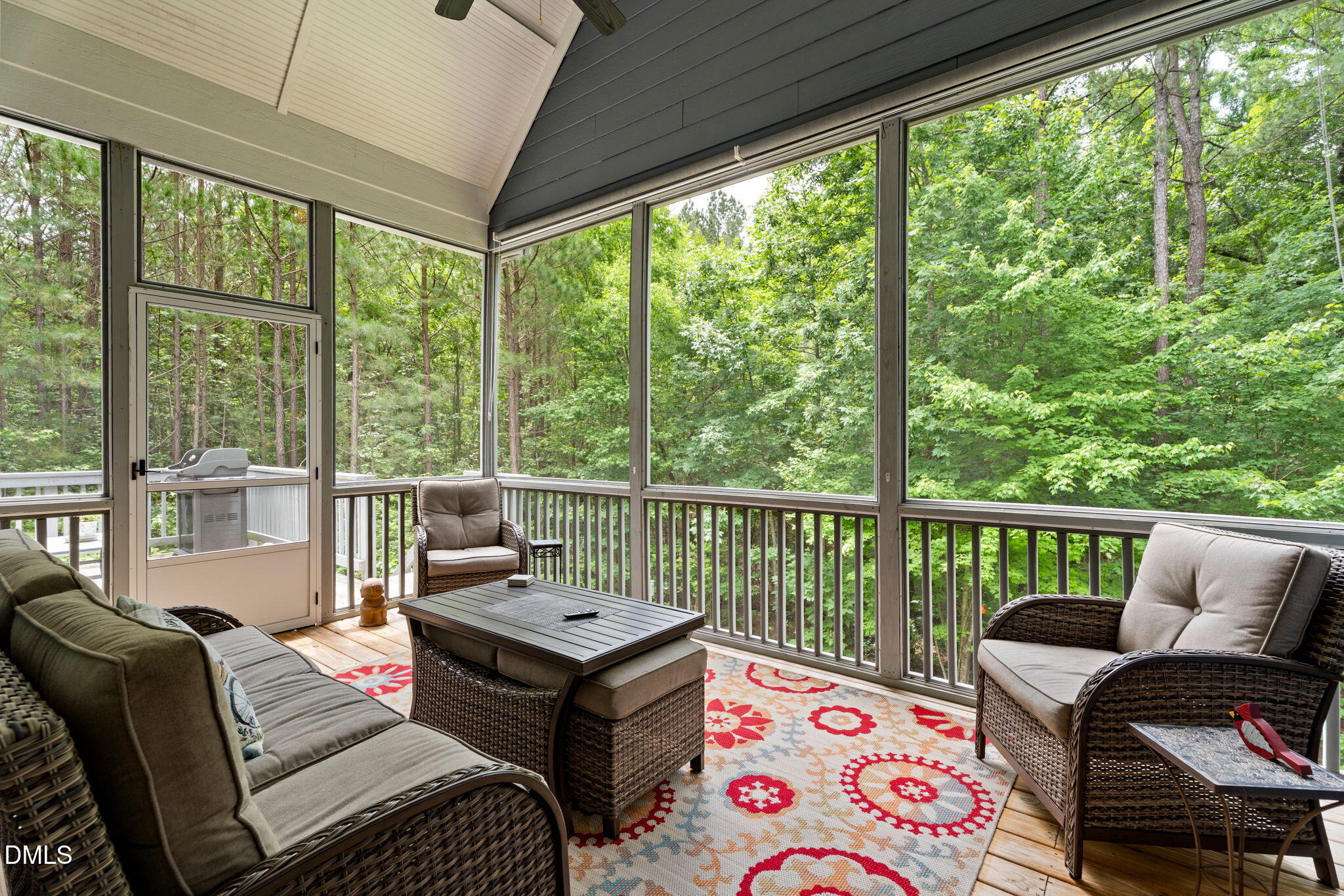 223 Colonial Ridge Drive Pittsboro, NC 27312 - Photo 14 of 47 a living room with furniture and a floor to ceiling window