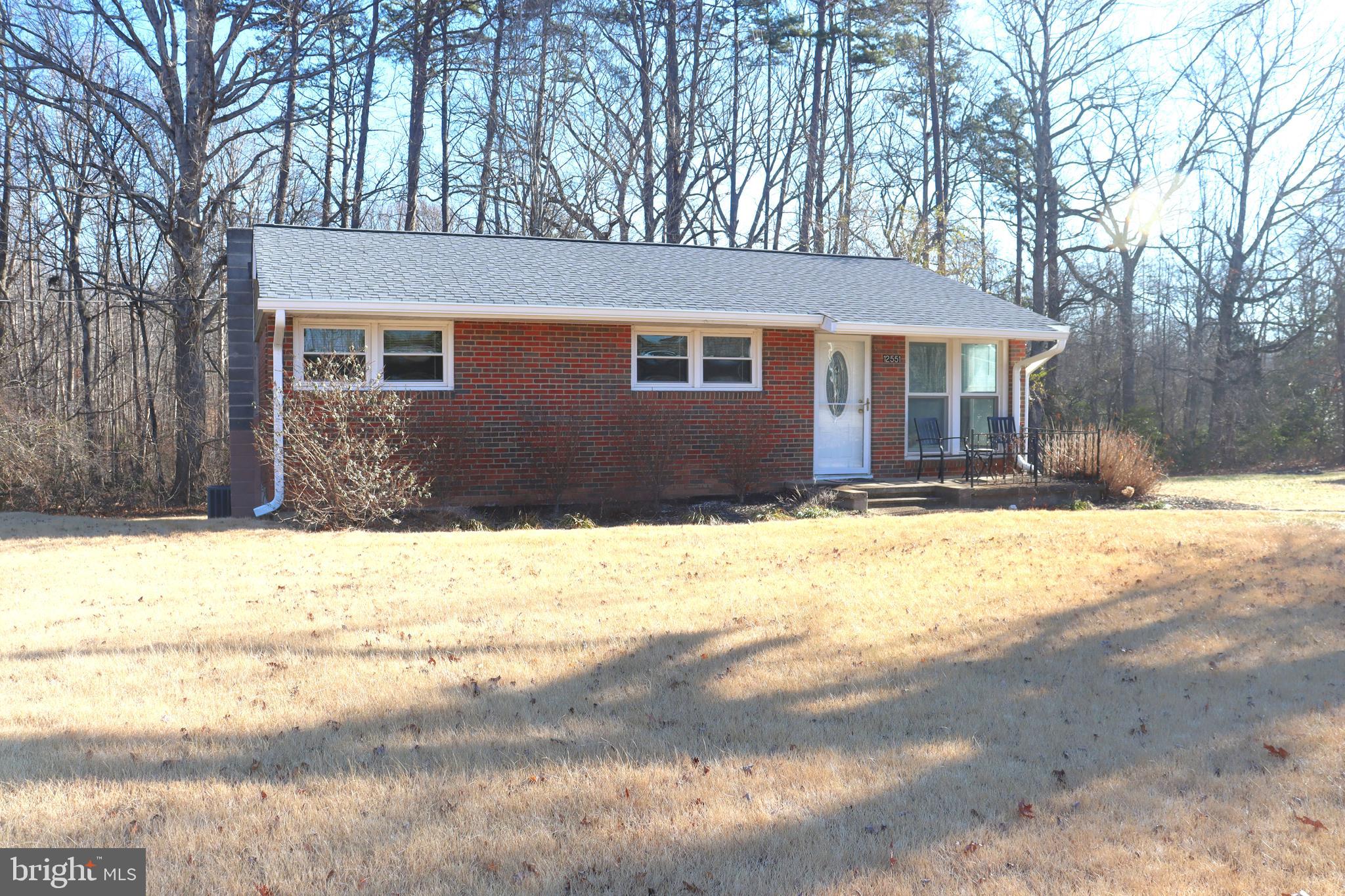 All brick home on 1.03 acre lot.