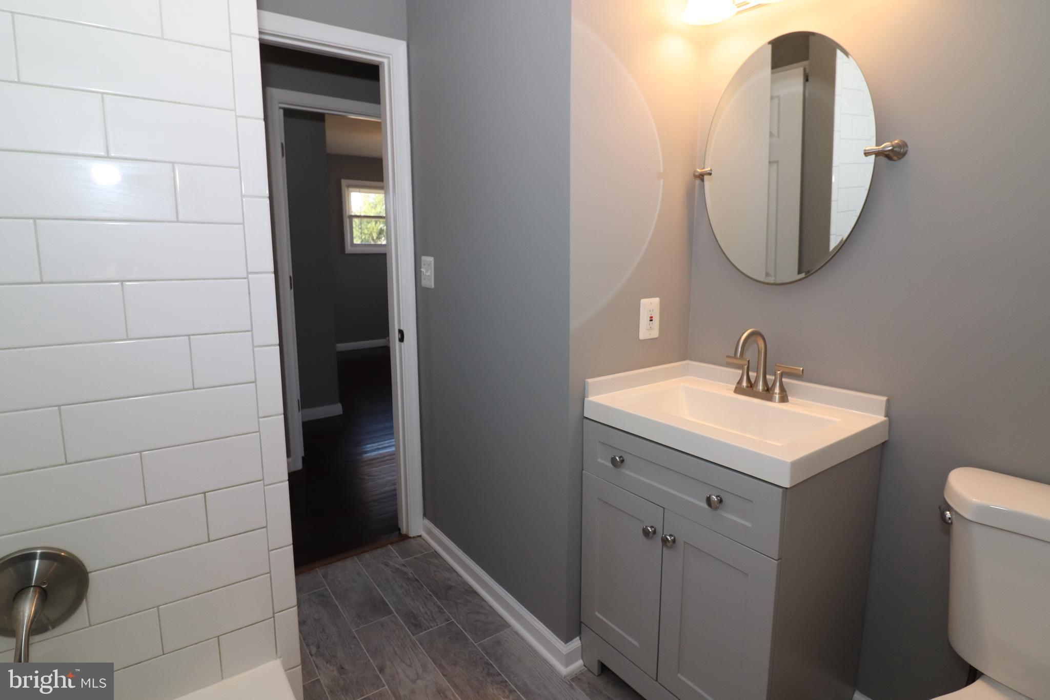 12551 Bristersburg Road Midland, VA 22728 - Photo 17 of 33 a bathroom with a sink and a mirror