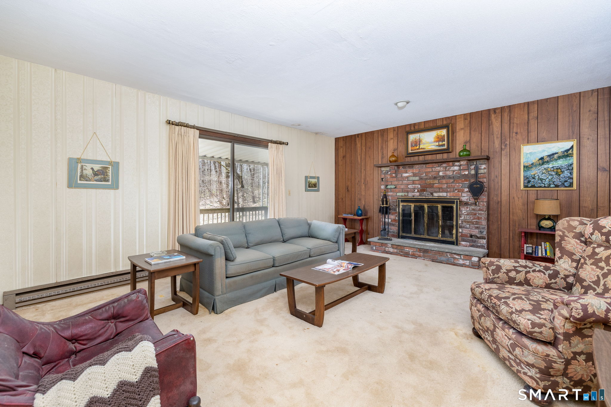 213 Brush Hill Road Litchfield, CT 06759 - Photo 5 of 27 FIREPLACE AND SLIDERS TO DECK