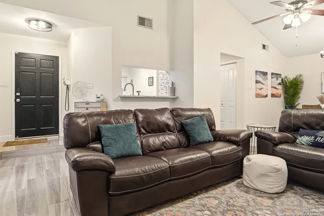 a living room with furniture and a couch