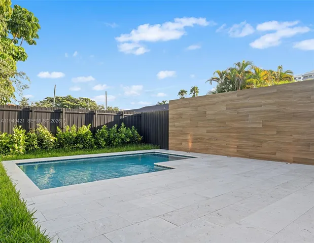 a view of swimming pool with an outdoor space