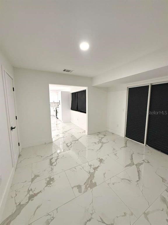 1048 Newbern Street Northeast Palm Bay, FL 32905 - Photo 11 of 29 a view of an empty room