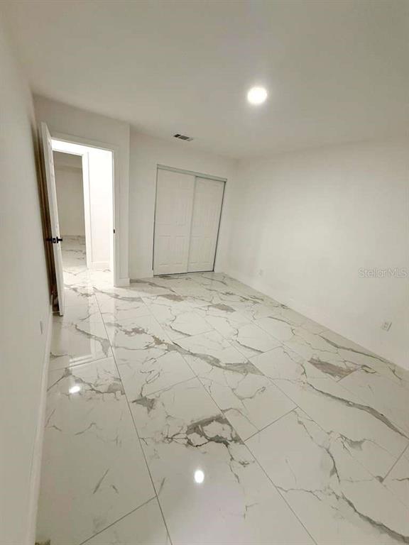 1048 Newbern Street Northeast Palm Bay, FL 32905 - Photo 5 of 29 a view of empty room