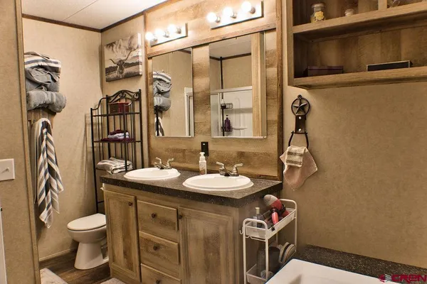 a bathroom with a sink and mirror