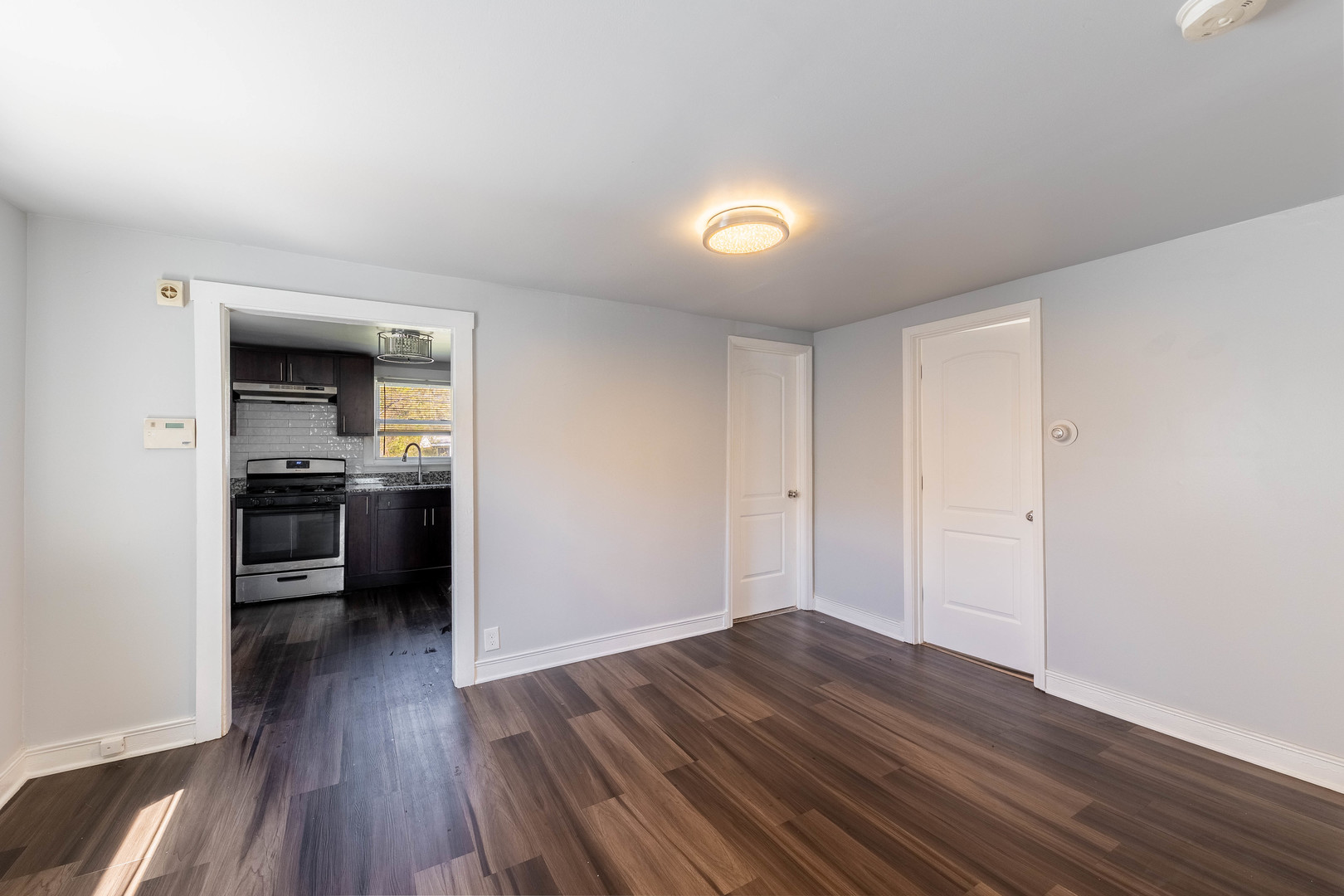 14536 Ridgeway Avenue Midlothian, IL 60445 - Photo 5 of 18 a view of a kitchen counter space and wooden floor