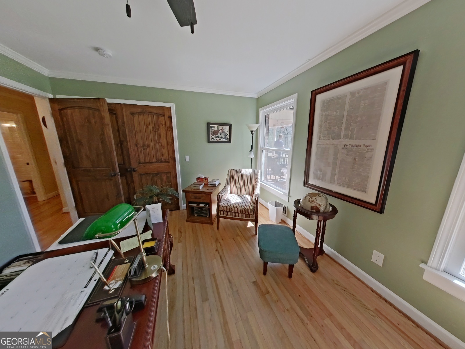 1491 Jack Malcolm Road Madison, GA 30650 - Photo 13 of 22 a living room with furniture and a wooden floor