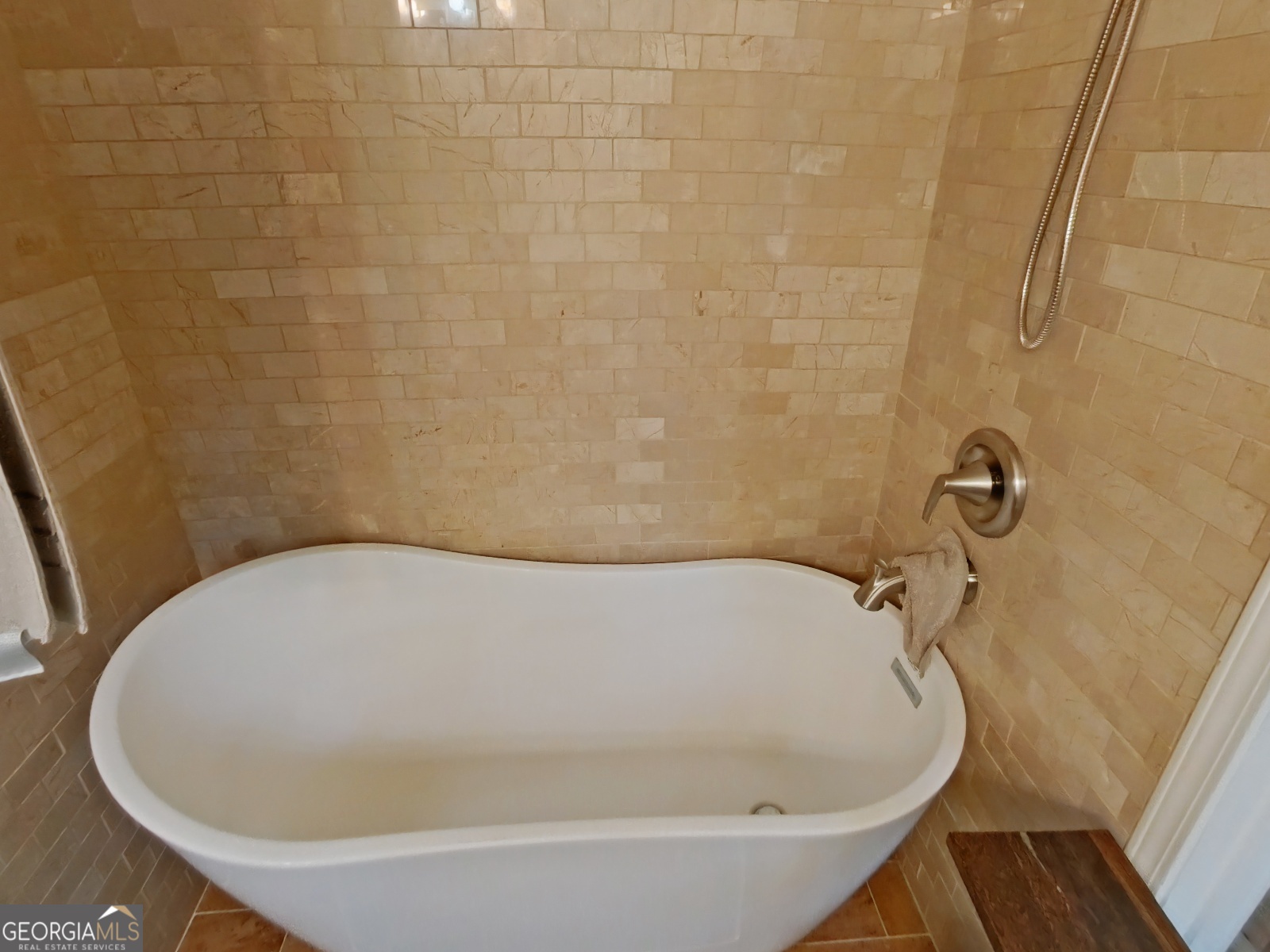 1491 Jack Malcolm Road Madison, GA 30650 - Photo 15 of 22 a bathroom with a bathtub