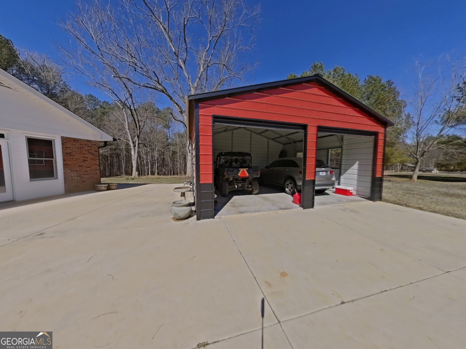 1491 Jack Malcolm Road Madison, GA 30650 - Photo 18 of 22 a view of a house with a patio