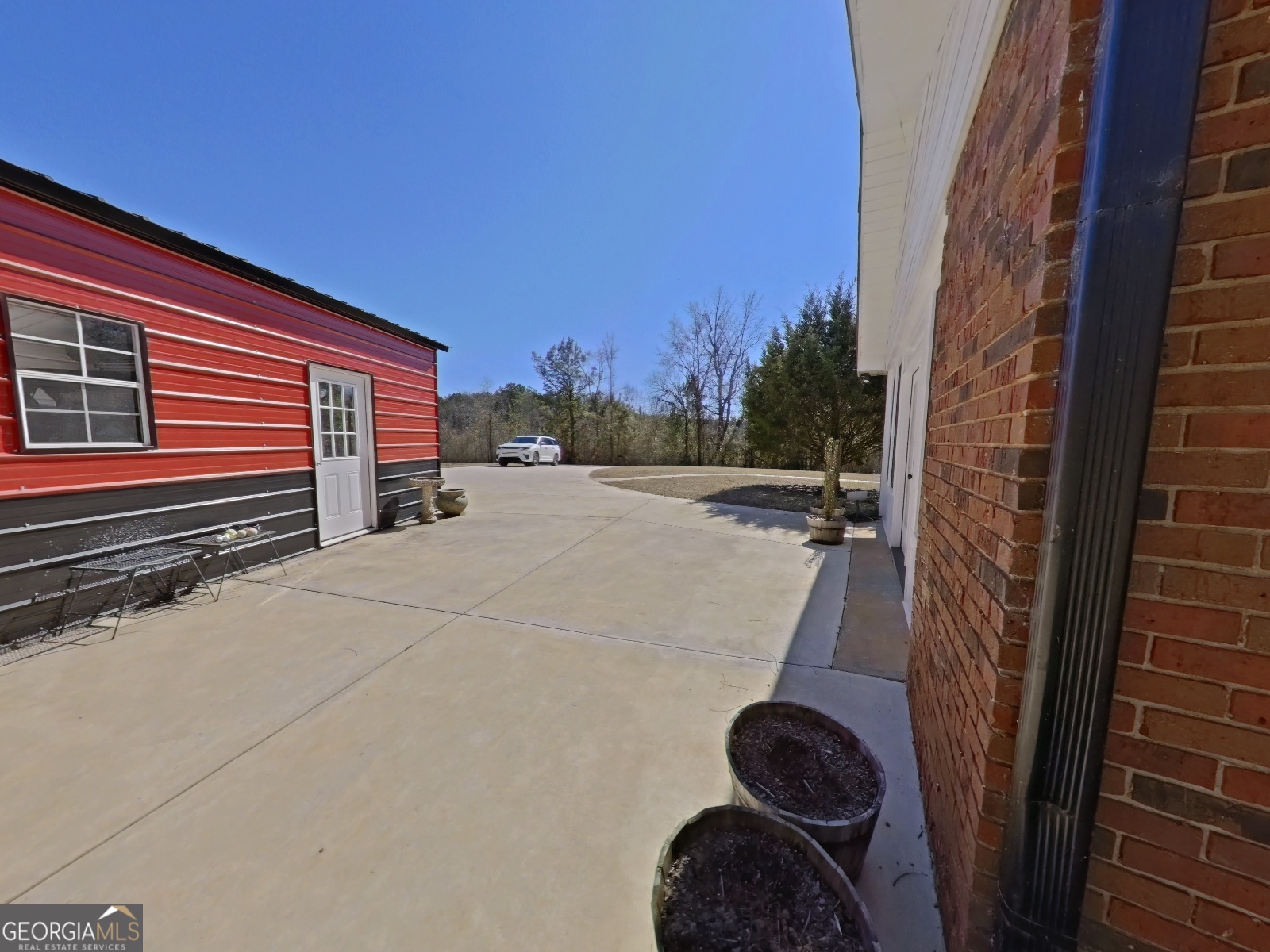 1491 Jack Malcolm Road Madison, GA 30650 - Photo 19 of 22 a view of backyard and porch