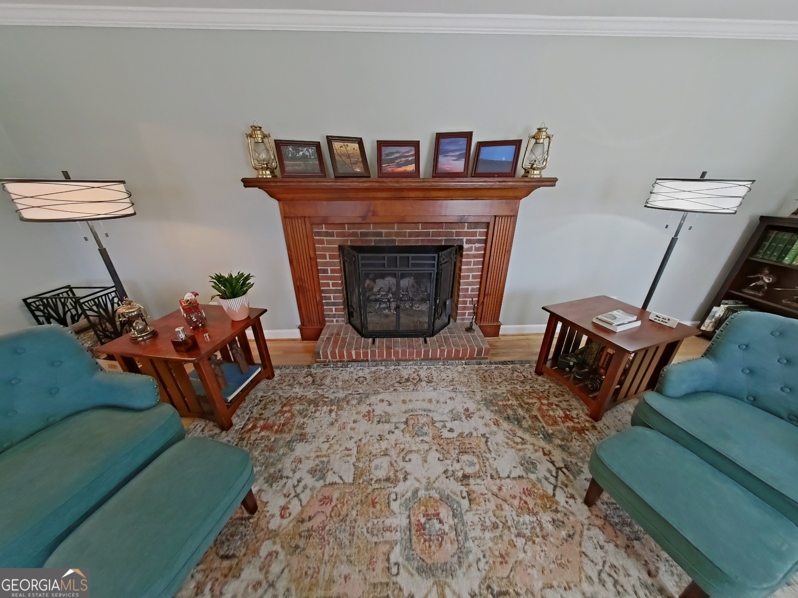 1491 Jack Malcolm Road Madison, GA 30650 - Photo 4 of 22 a living room with furniture and a fireplace