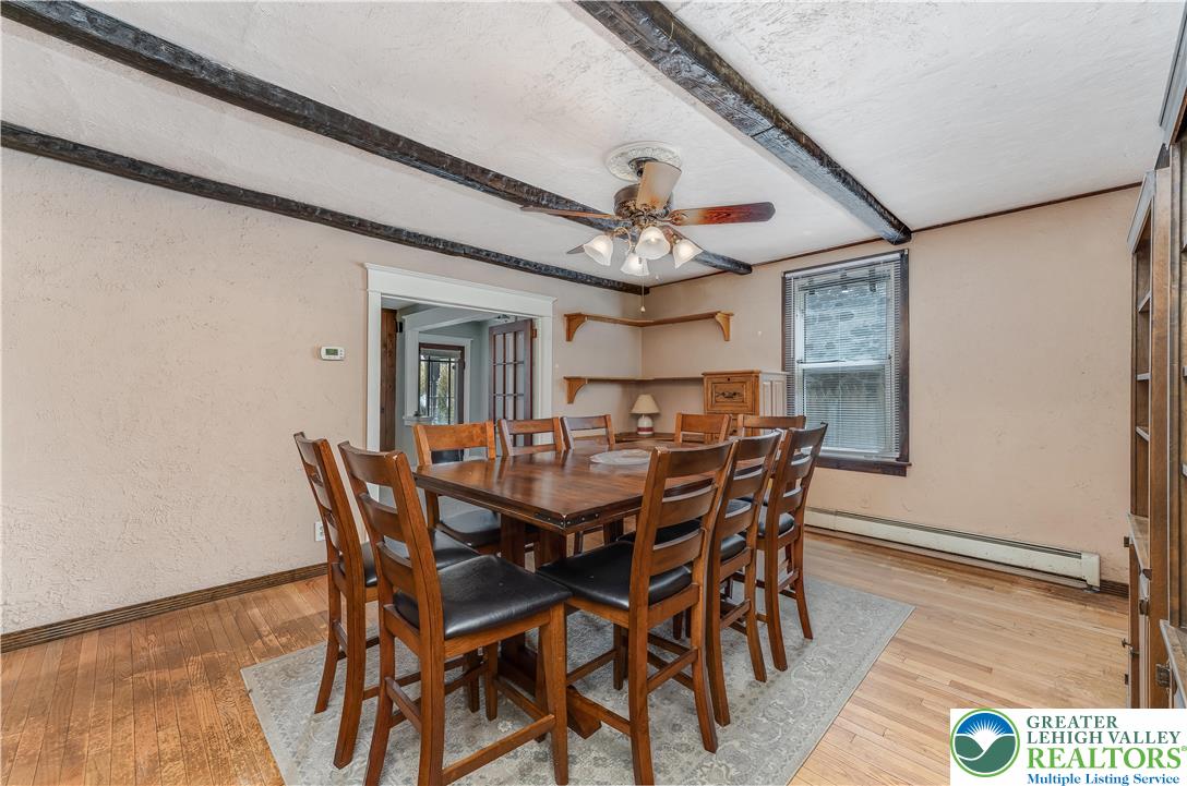 3271 Water Street Whitehall, PA 18052 - Photo 7 of 32 a view of a dining room with furniture and a chandelier