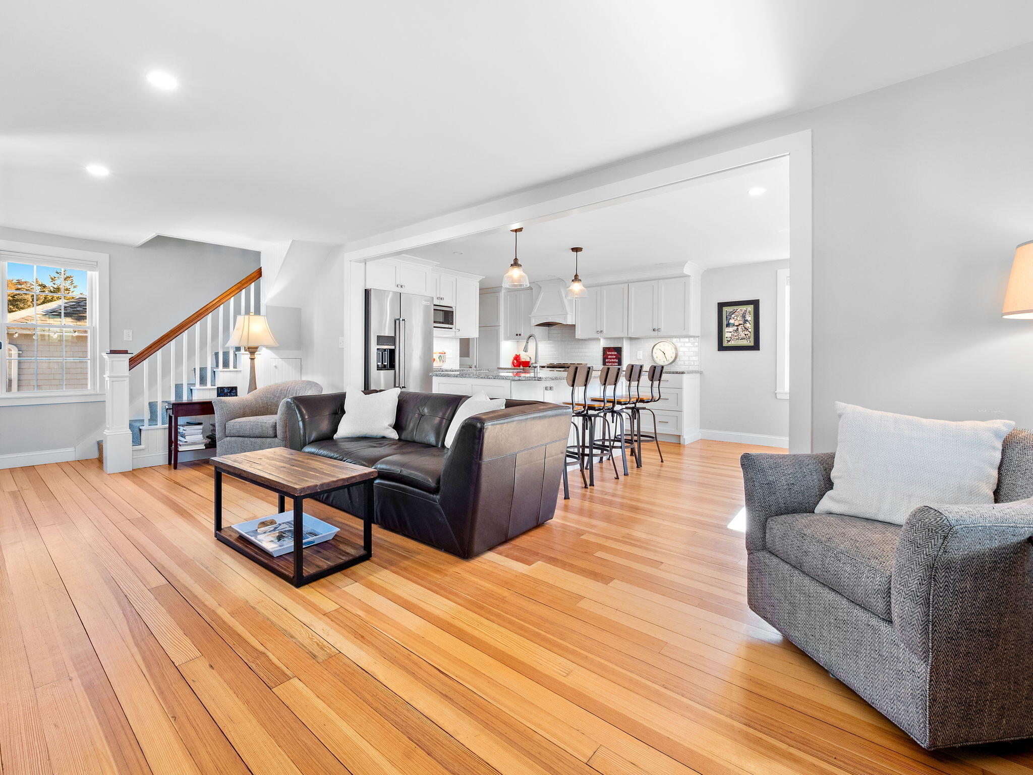 28 Spurr Road Pocasset, MA 02559 - Photo 15 of 47 a living room with furniture and a wooden floor