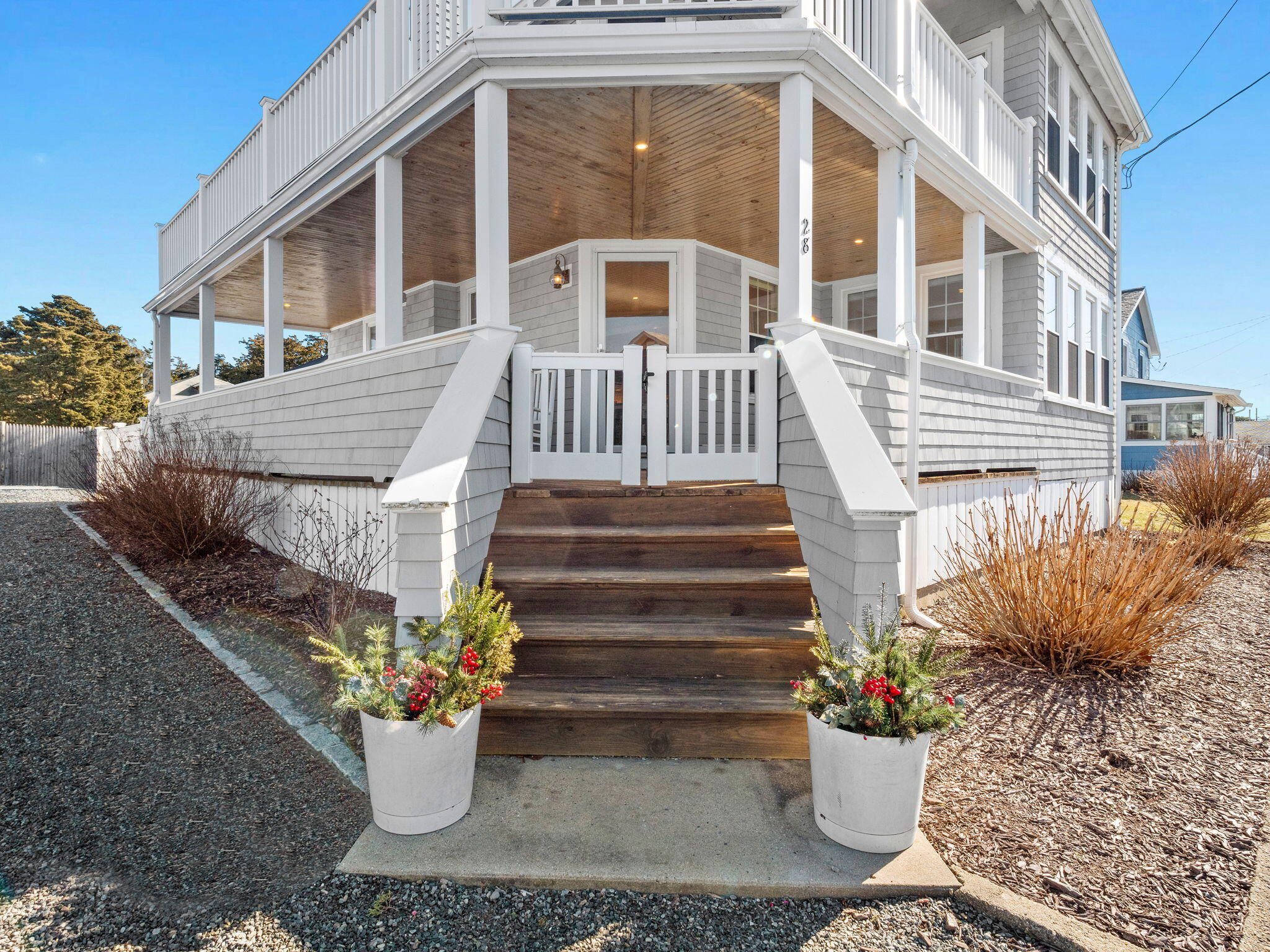 28 Spurr Road Pocasset, MA 02559 - Photo 3 of 47 a front view of a house with a yard