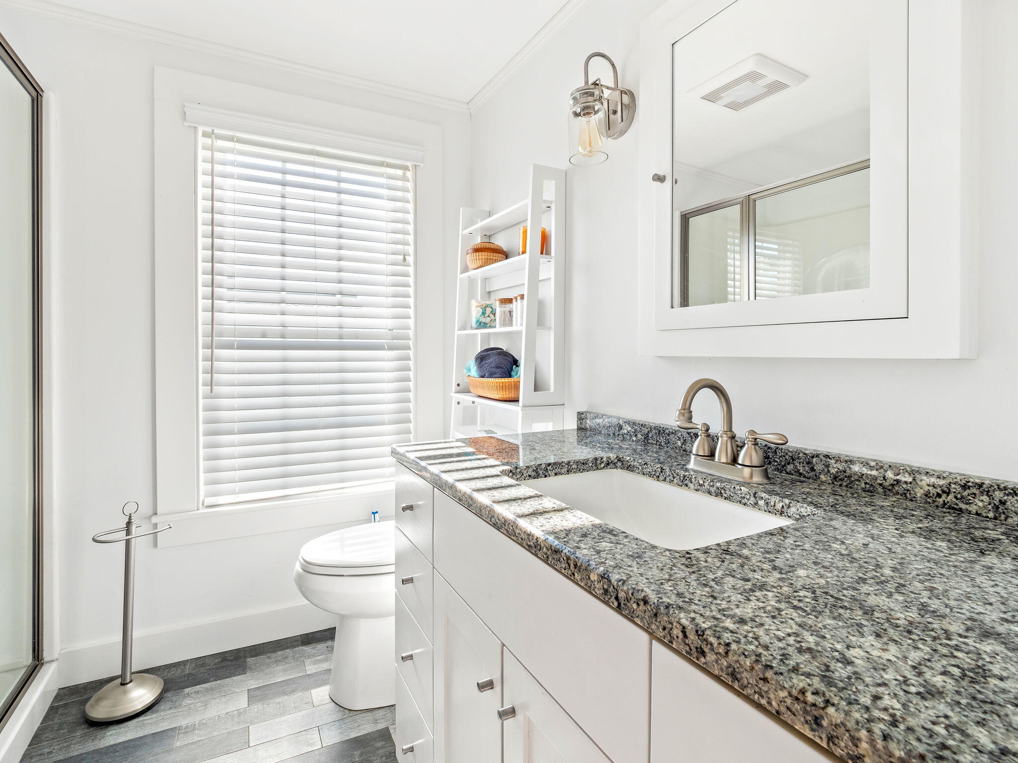 28 Spurr Road Pocasset, MA 02559 - Photo 34 of 47 a bathroom with a granite countertop sink and a mirror