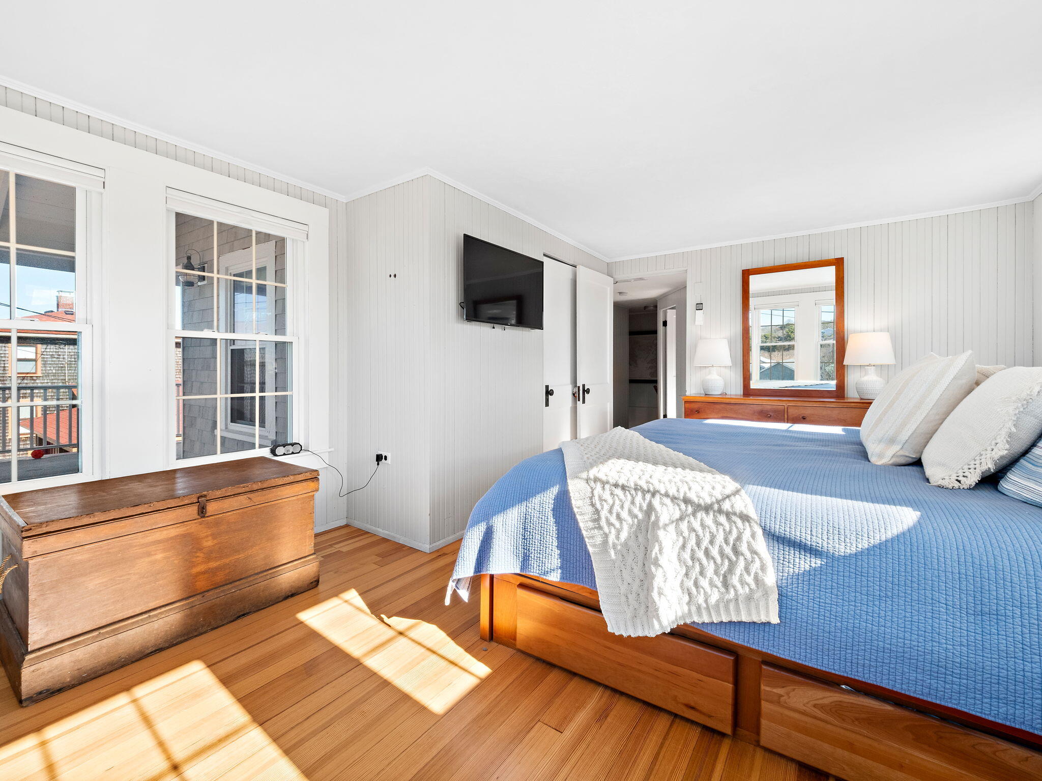 28 Spurr Road Pocasset, MA 02559 - Photo 37 of 47 a spacious bedroom with a bed and wooden floor