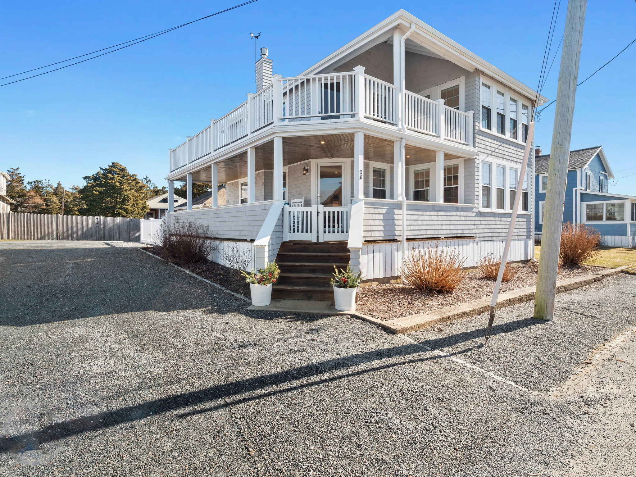 28 Spurr Road Pocasset, MA 02559 - Photo 4 of 47 a front view of a house with a yard