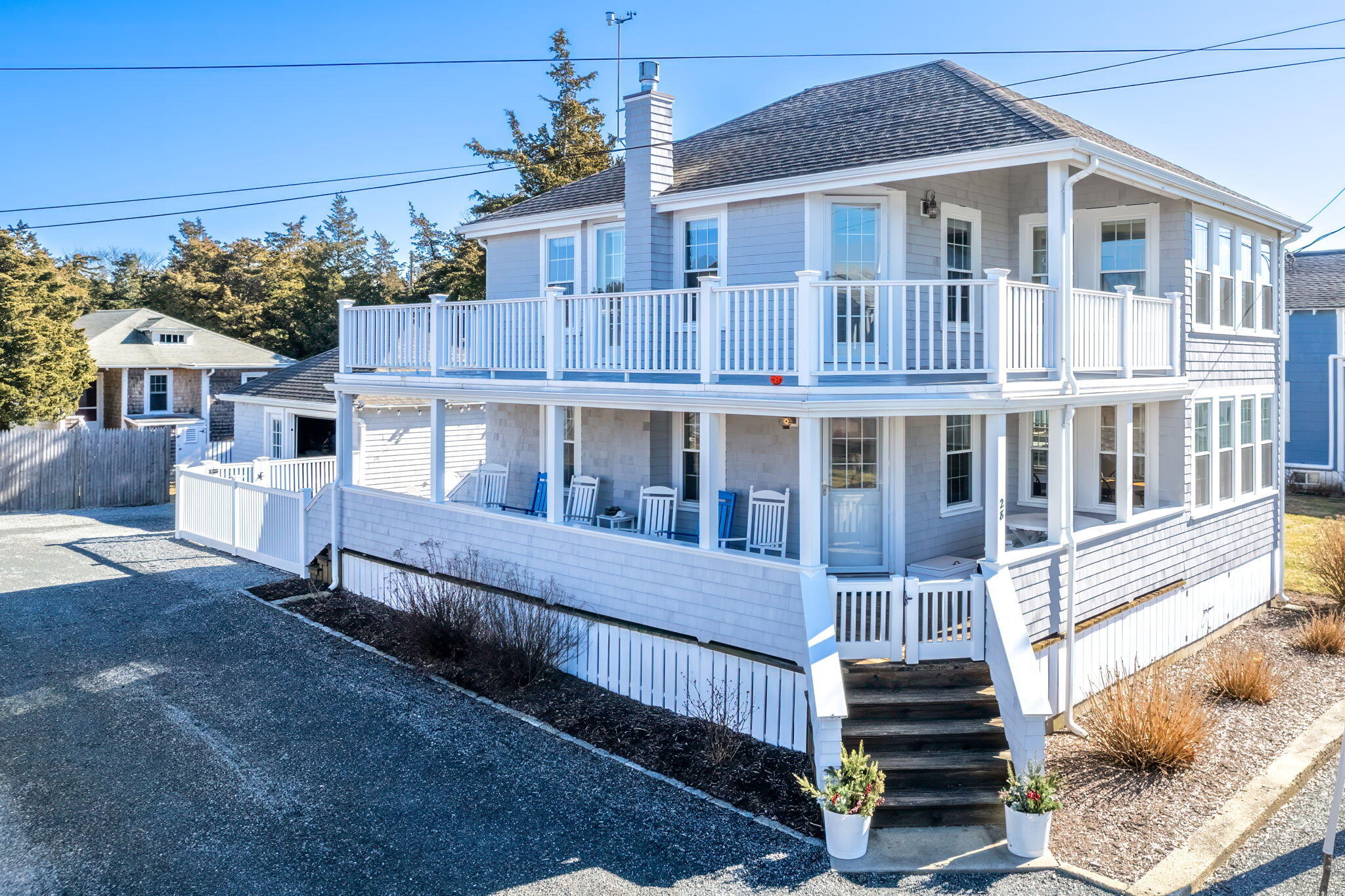 28 Spurr Road Pocasset, MA 02559 - Photo 5 of 47 a front view of a house with a yard
