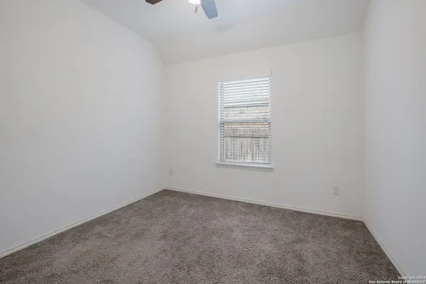 a view of a back yard of the house