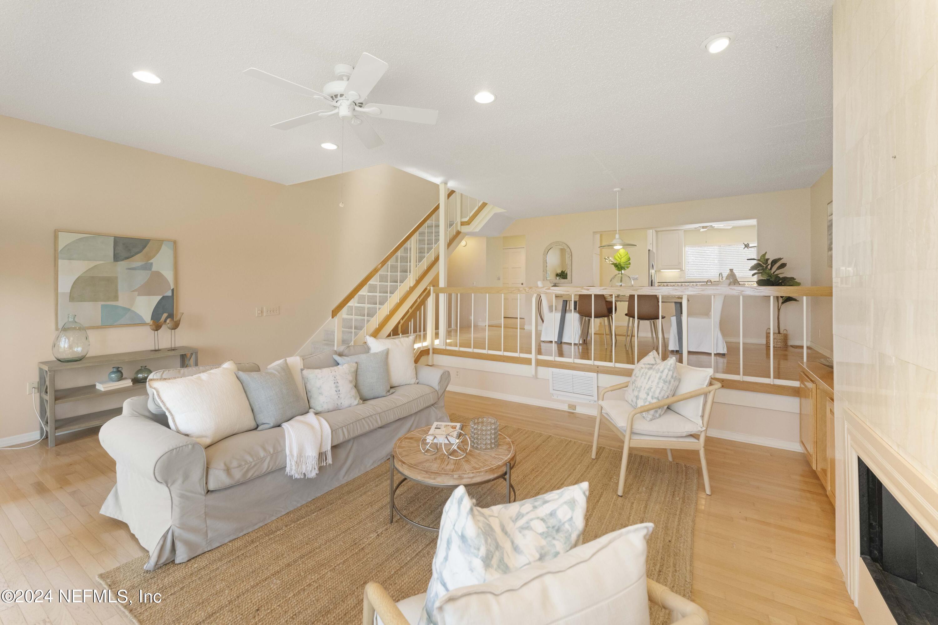 2279 Seminole Road, Unit 4 Atlantic Beach, FL 32233 - Photo 11 of 45 a living room with furniture and wooden floor