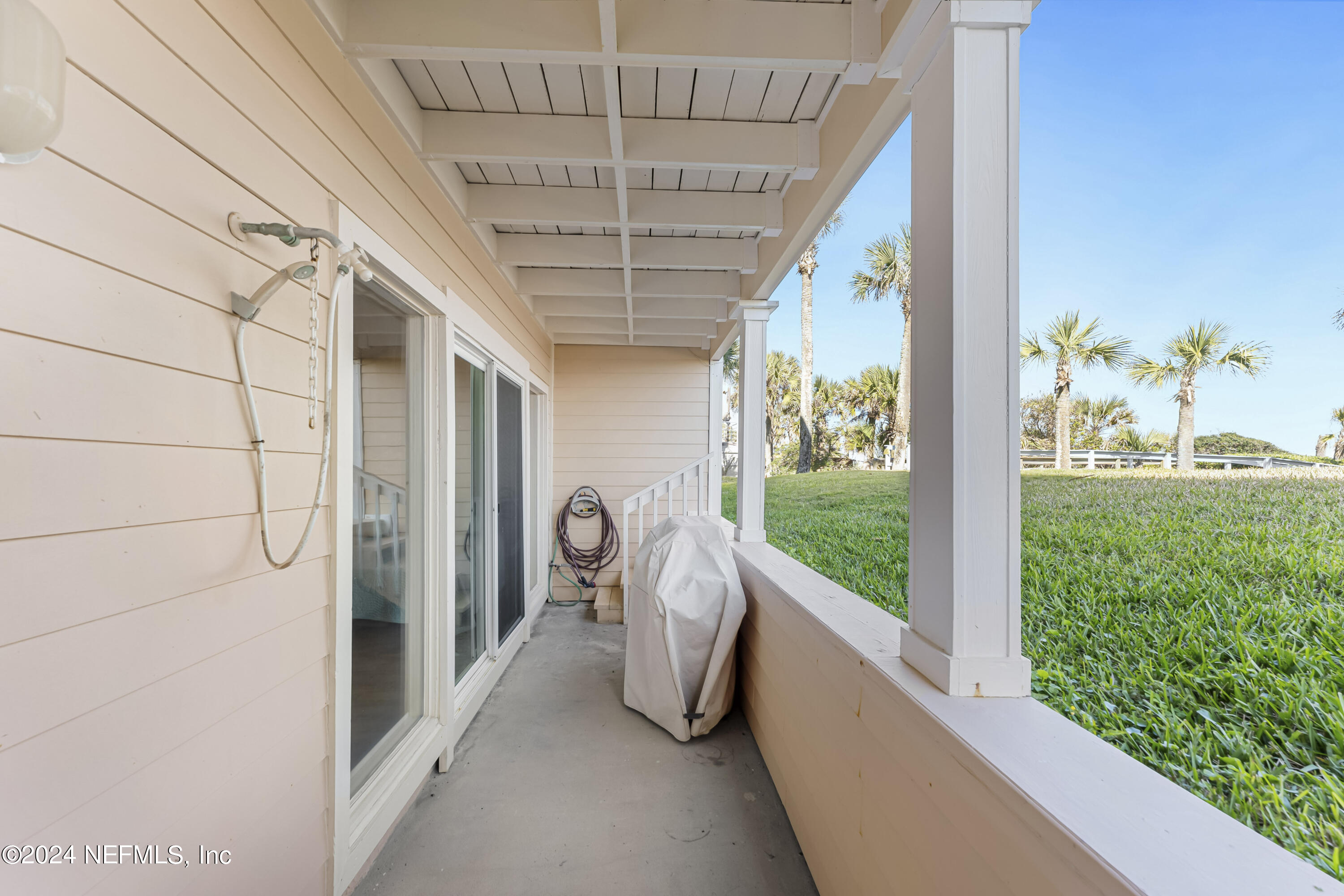2279 Seminole Road, Unit 4 Atlantic Beach, FL 32233 - Photo 27 of 45 a view of a porch with seating space