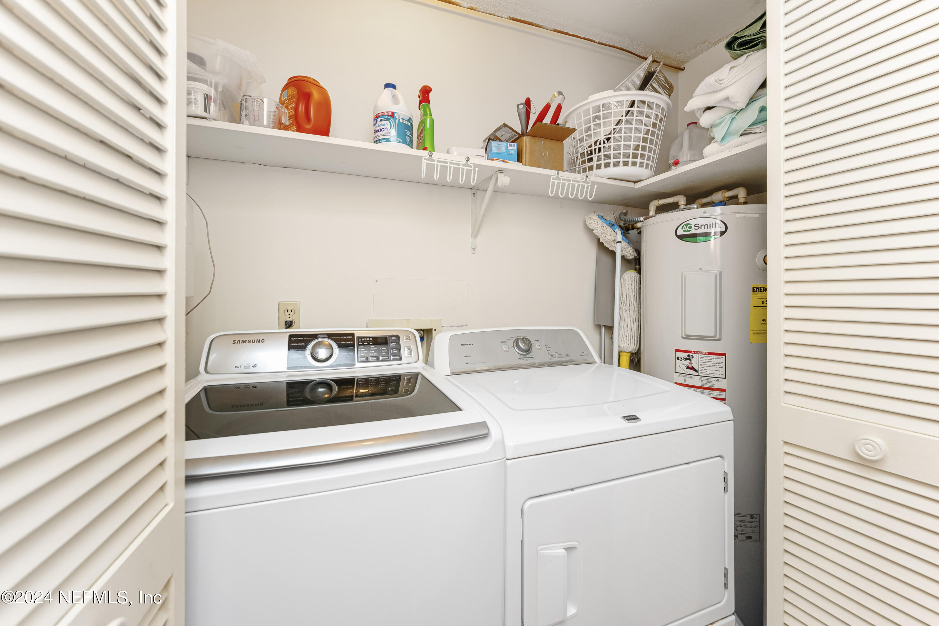2279 Seminole Road, Unit 4 Atlantic Beach, FL 32233 - Photo 29 of 45 a utility room with dryer and washer