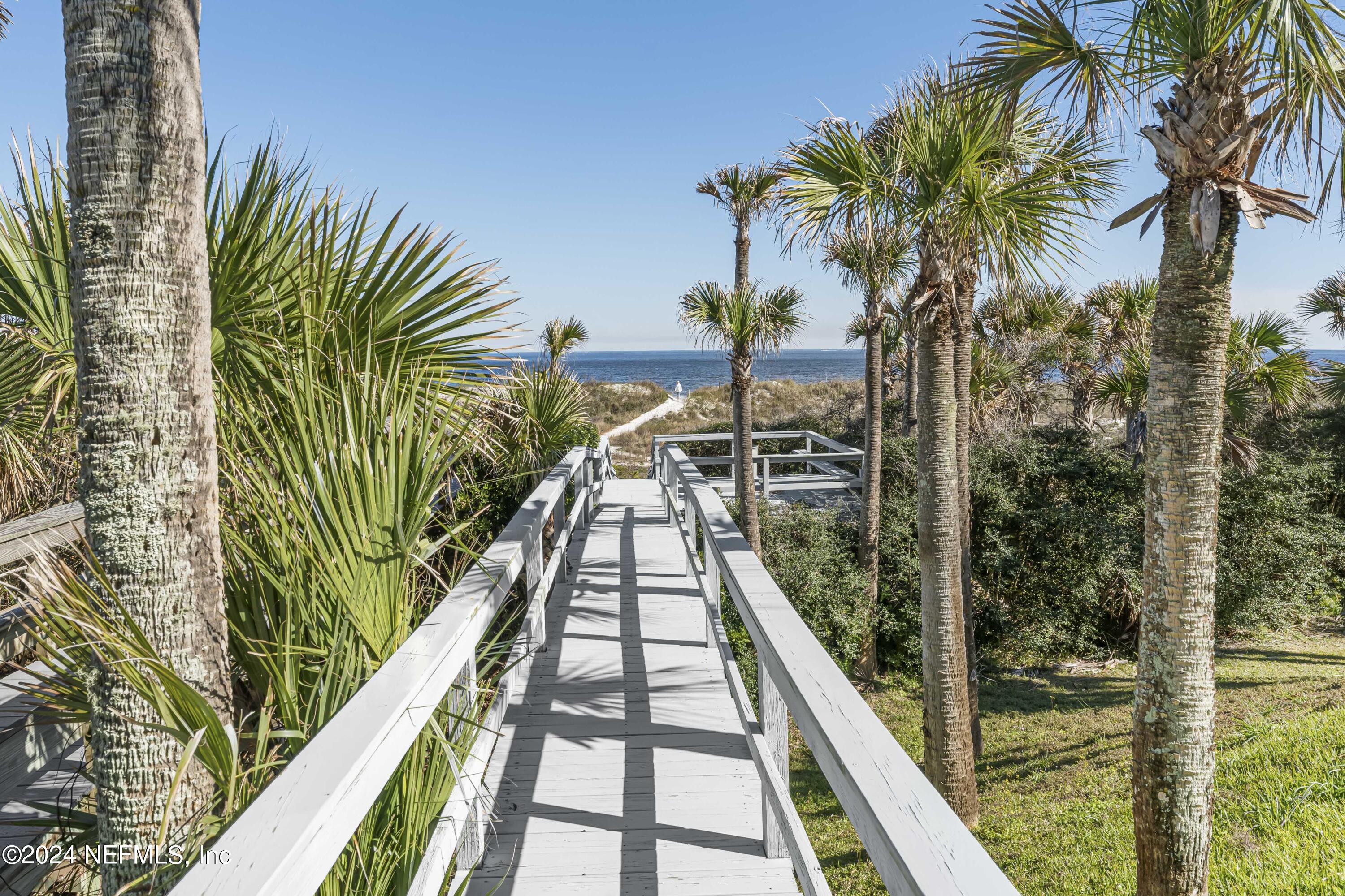 2279 Seminole Road, Unit 4 Atlantic Beach, FL 32233 - Photo 31 of 45 a view of swimming pool with a garden