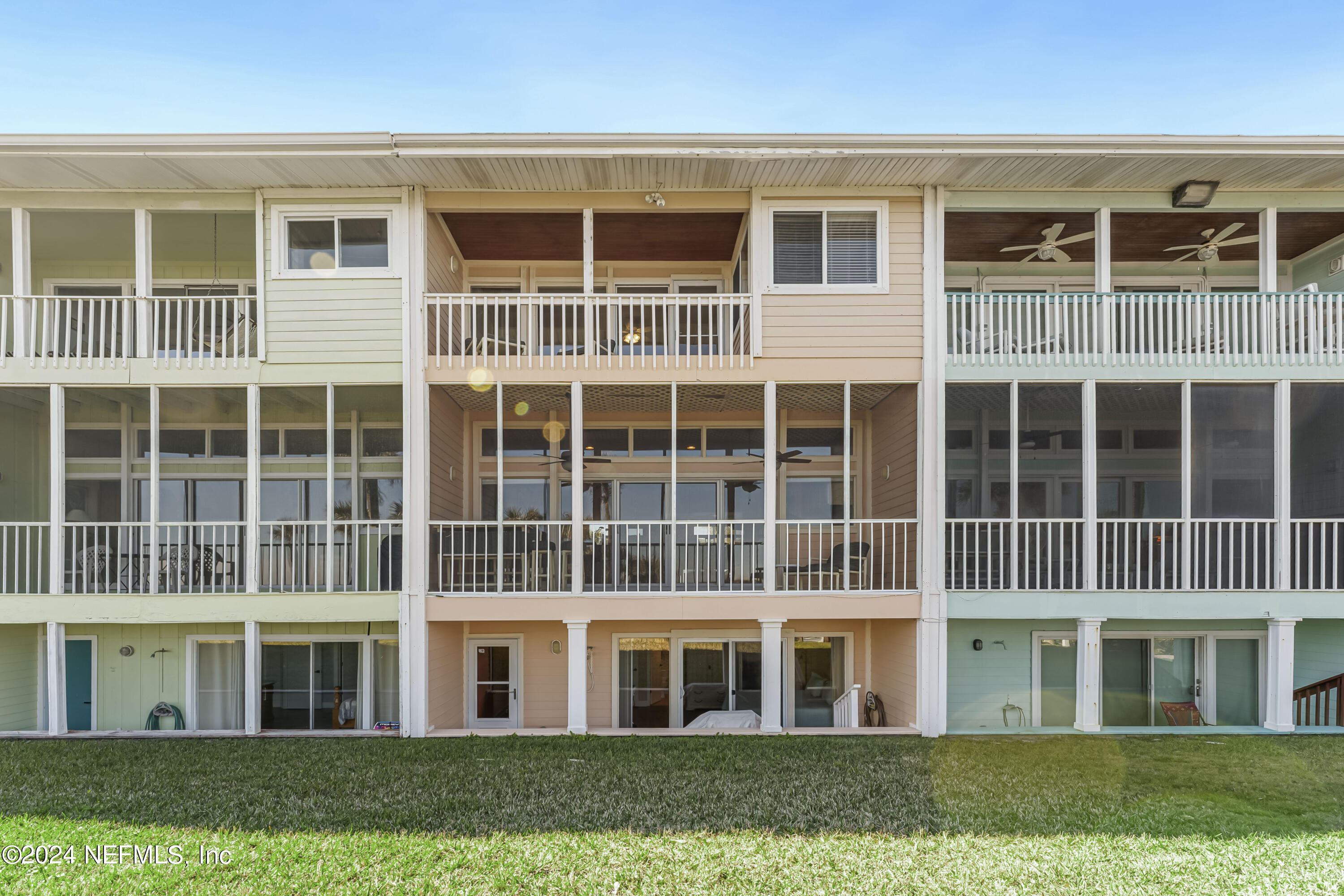 2279 Seminole Road, Unit 4 Atlantic Beach, FL 32233 - Photo 35 of 45 a big building with a yard