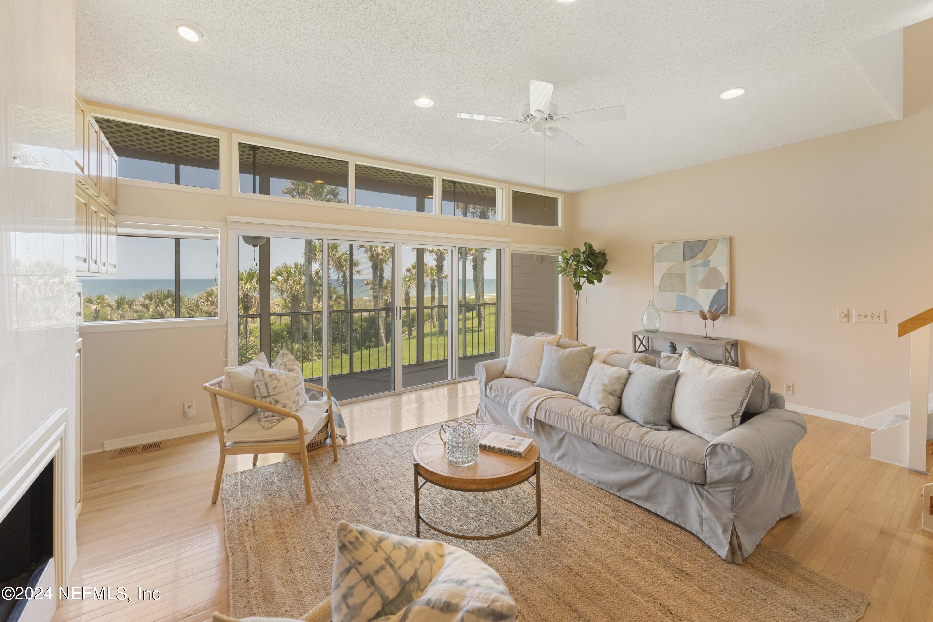 2279 Seminole Road, Unit 4 Atlantic Beach, FL 32233 - Photo 8 of 45 a living room with furniture and a large window