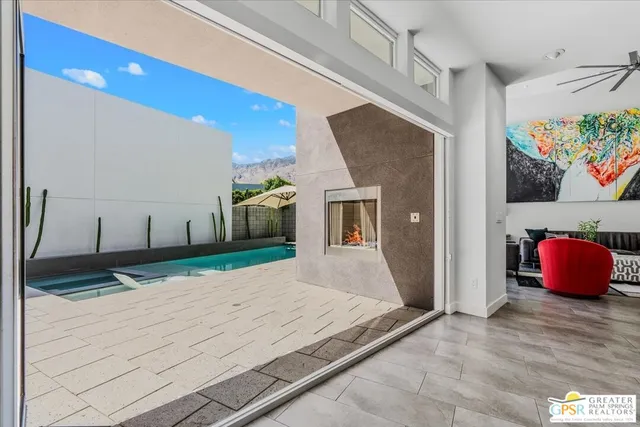 a hallway with a large mirror