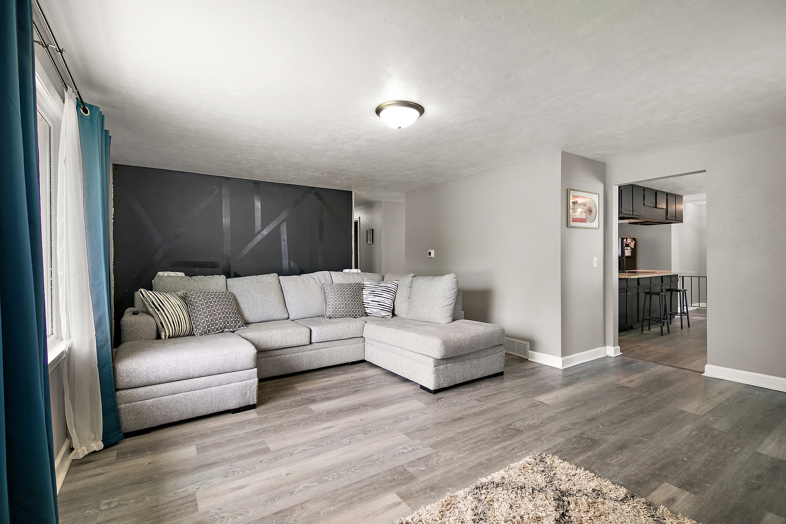 1572 North 2000E Road Bourbonnais, IL 60914 - Photo 3 of 18 a living room with furniture and a wooden floor