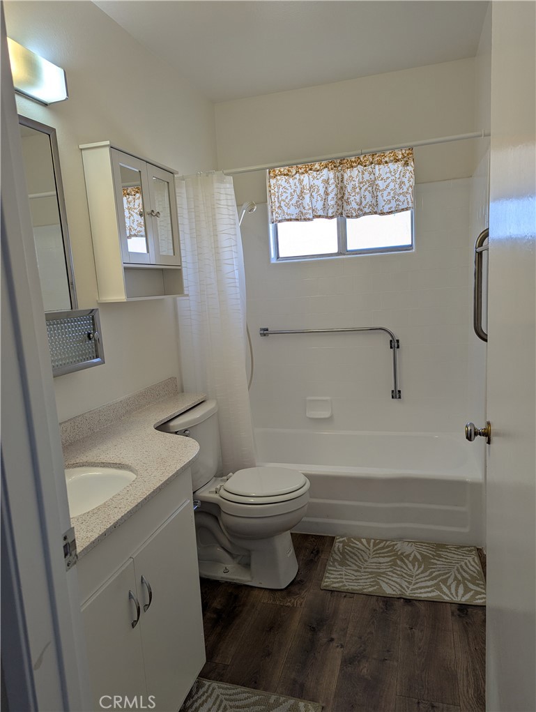 280 Mary Hemet, CA 92543 - Photo 11 of 18 a bathroom with a sink toilet and window