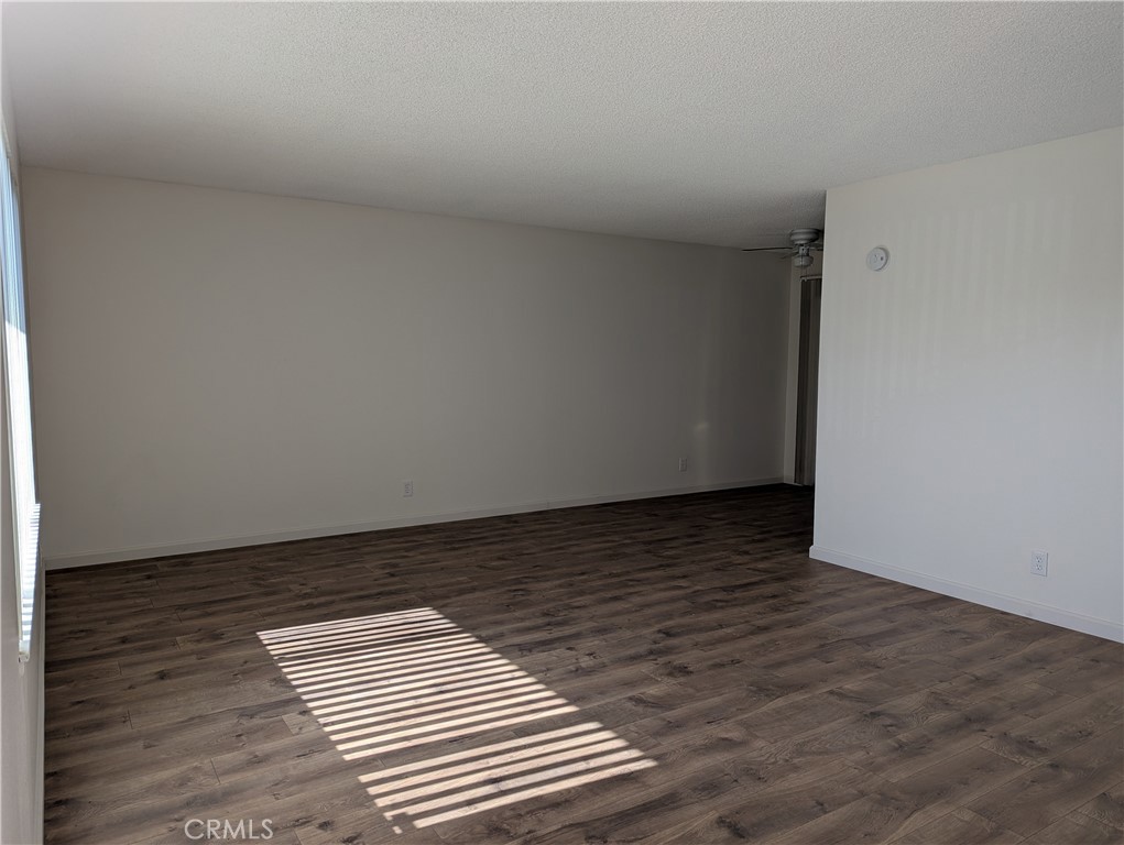 280 Mary Hemet, CA 92543 - Photo 4 of 18 a view of wooden floor and windows in a room