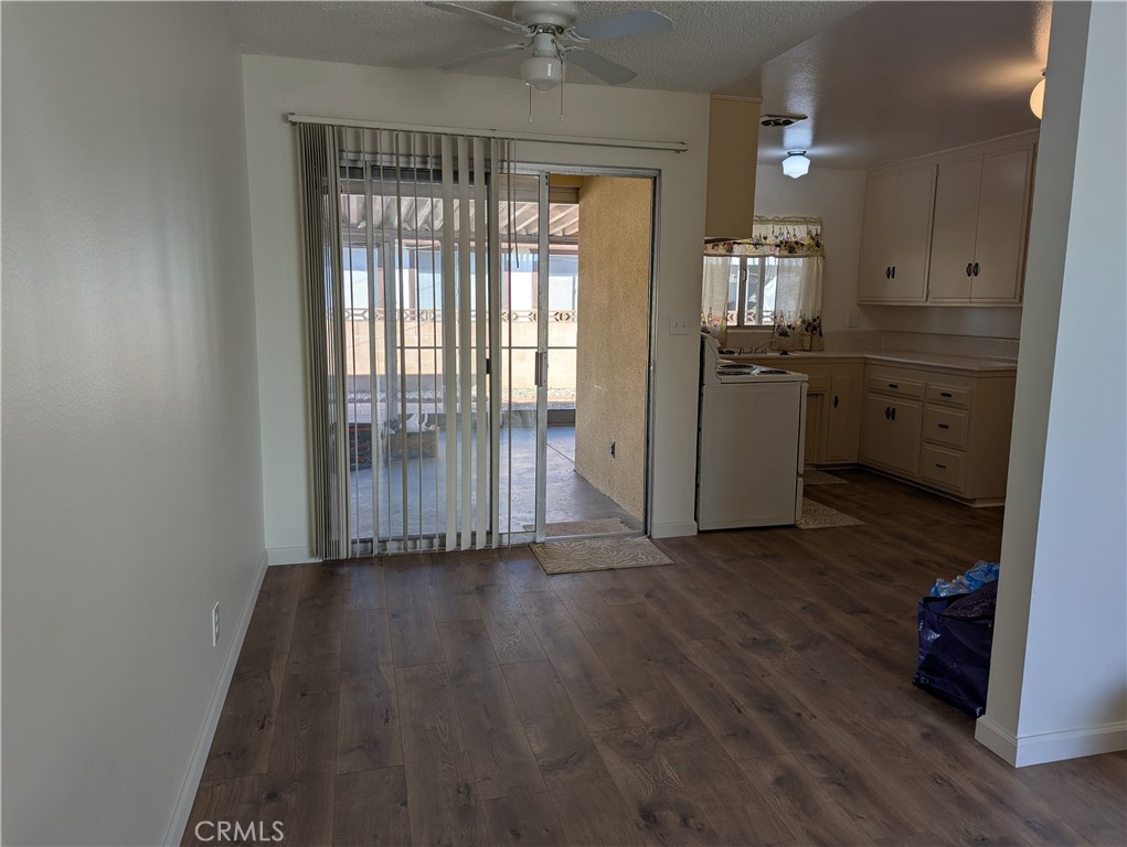 280 Mary Hemet, CA 92543 - Photo 5 of 18 a view of an empty room with a window and wooden floor