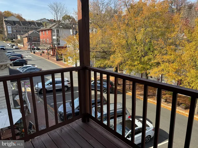 a front view of a house with a porch