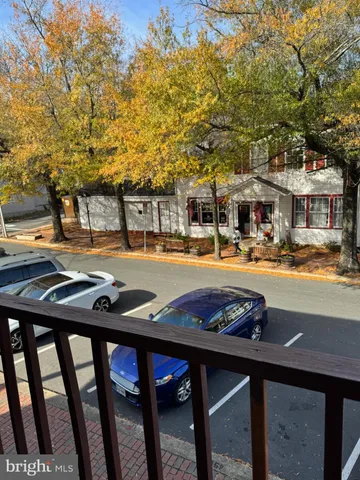 a kitchen with granite countertop a sink and cabinets