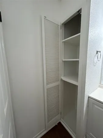 a room with walk in closet