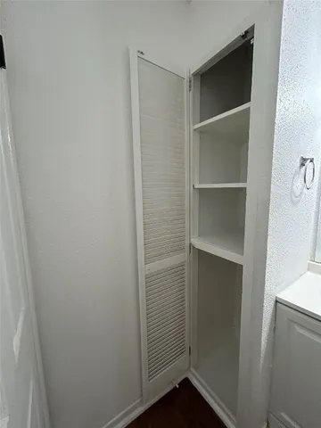 a room with walk in closet