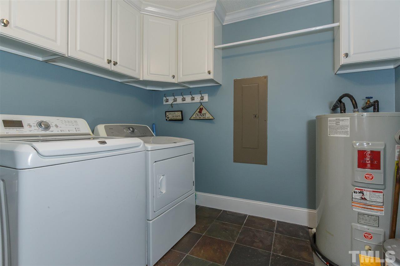 1117 Boone Road Burlington, NC 27217 - Photo 18 of 30 Upper cabinets offer awesome storage with rod with hanging as well