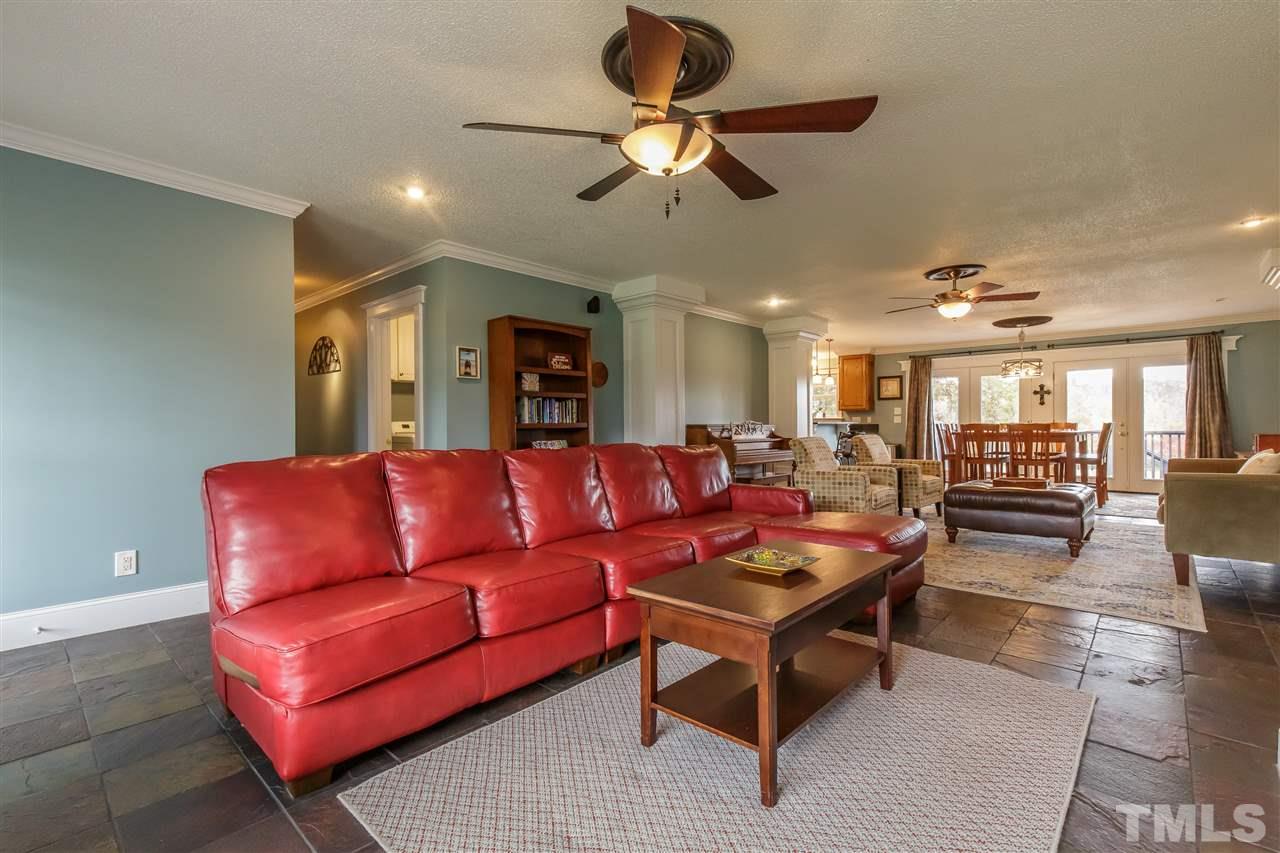 1117 Boone Road Burlington, NC 27217 - Photo 3 of 30 INCREDIBLE OPEN living area with tile flooring and heavy moldings