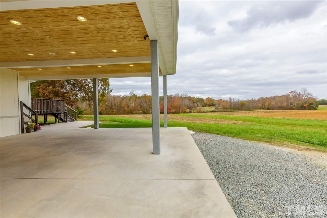 1117 Boone Road Burlington, NC 27217 - Photo 26 of 30 MASSIVE carport doubles as a covered space for family gatherings, celebrations, and parties with numerous recessed lights