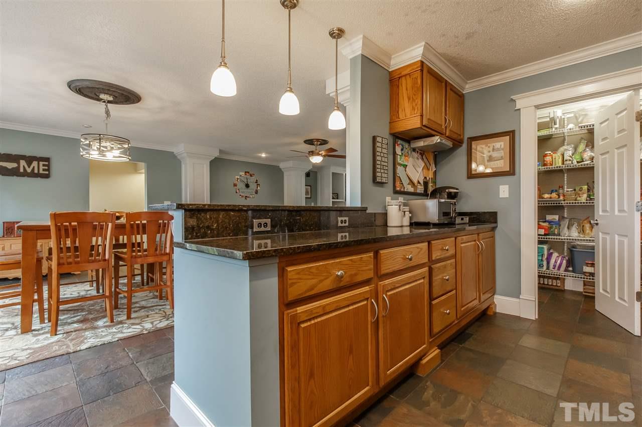 1117 Boone Road Burlington, NC 27217 - Photo 10 of 30 Generous granite counters and huge walk-in pantry of 8.9' x 4.10'