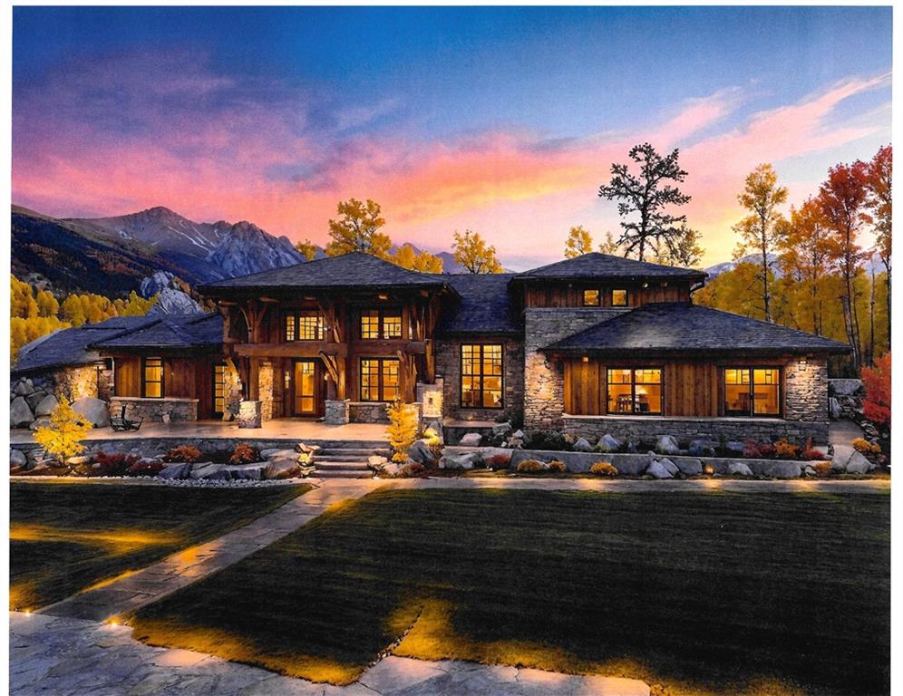 a front view of a house with a lake view