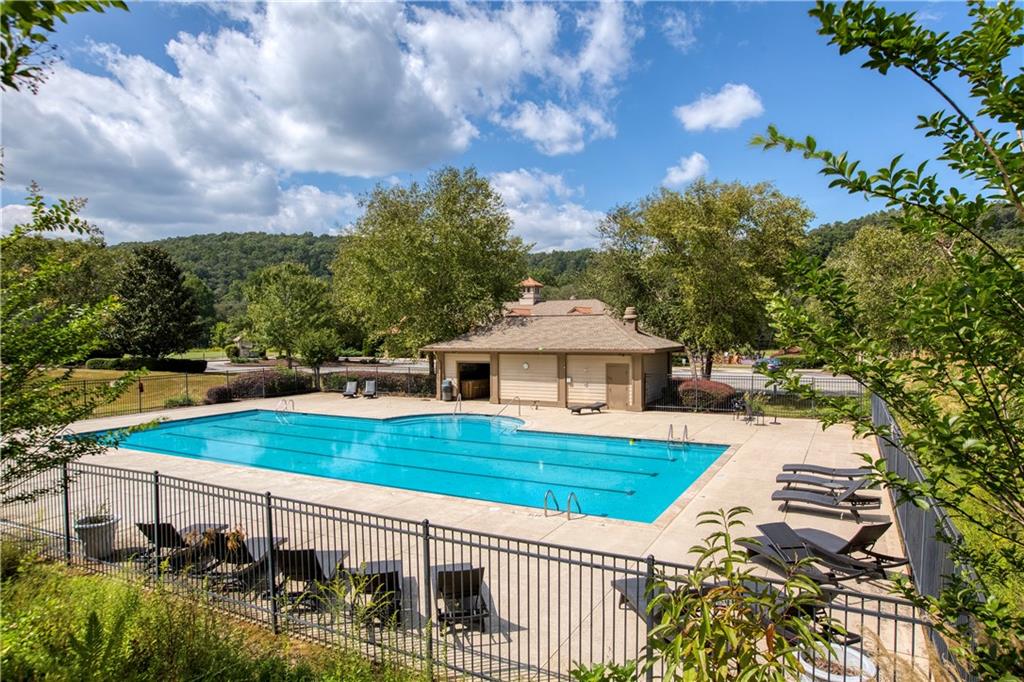 1024 Bear Paw Ridge Dahlonega, GA 30533 - Photo 26 of 41 a view of a house with pool and chairs