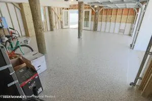 a close view of a utility room with dryer and washer